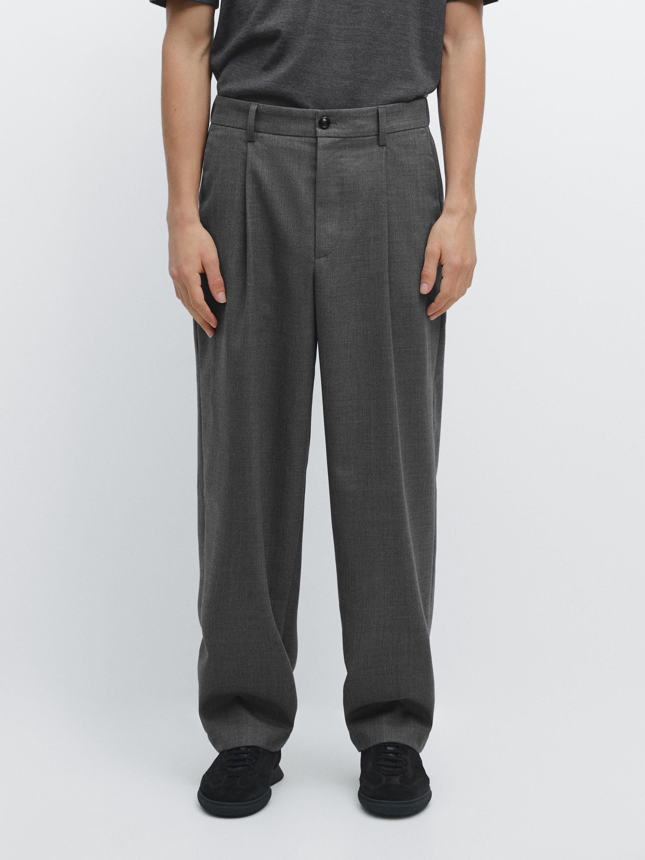 Pantalon relaxed fit à pinces en laine froide